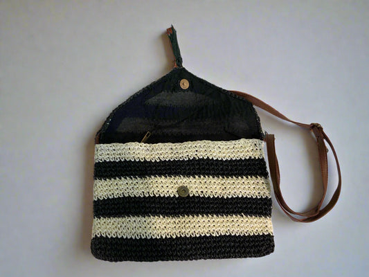 STRIPED WOVEN CLUTCH