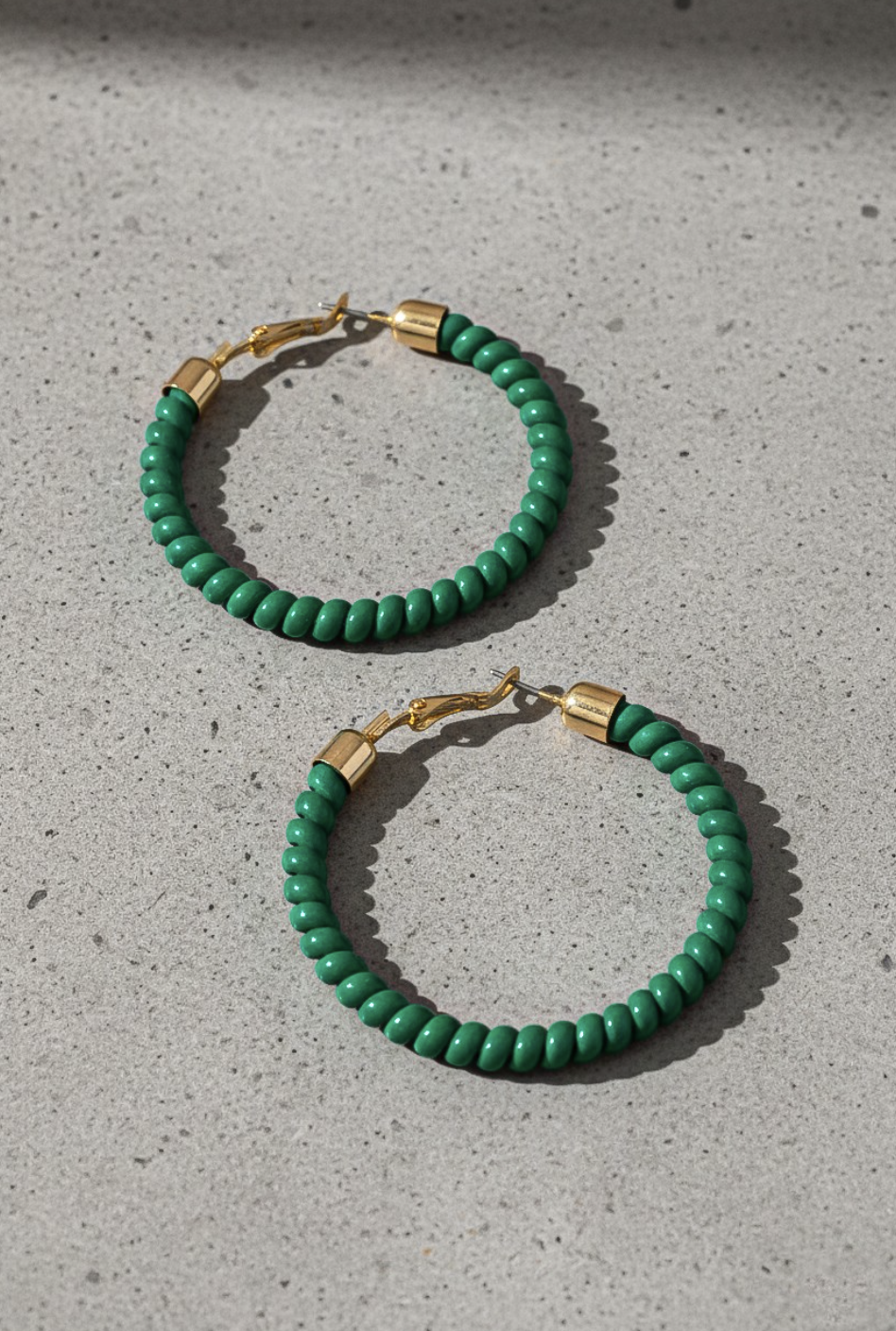 TWIST HOOP EARRINGS