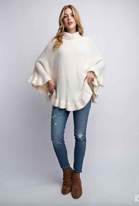 DIVA COZY RUFFLE HEM PONCHO SWEATER