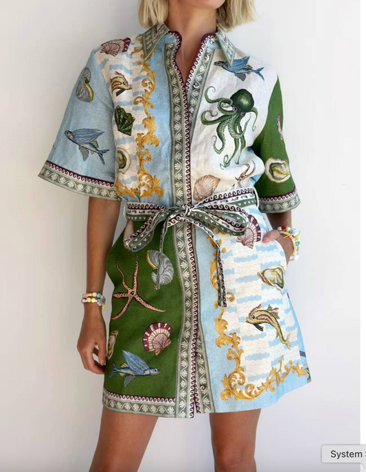 ELEGANT OCEAN PRINT BELTED DRESS