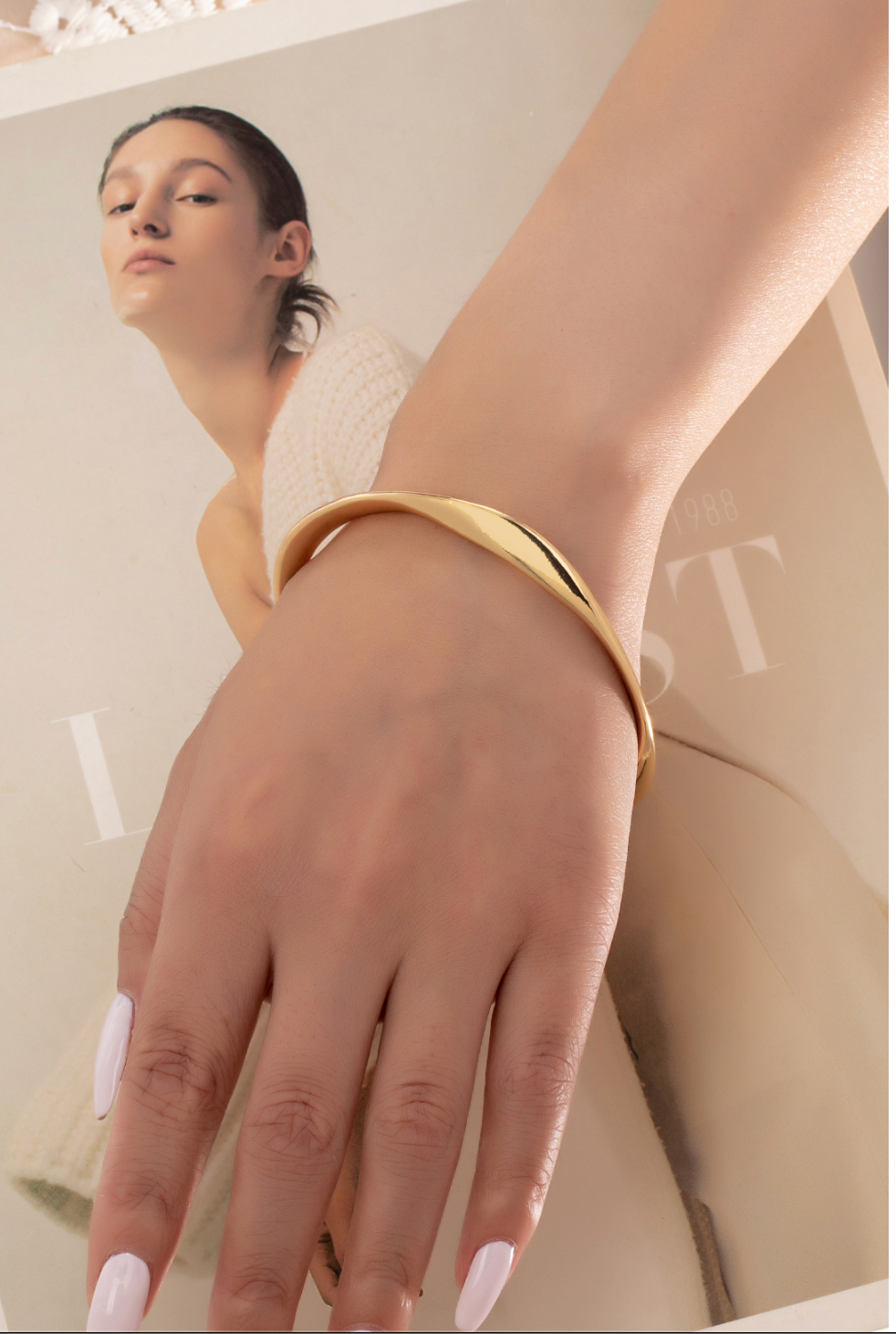 FLUID TWIST BANGLE BRACELET